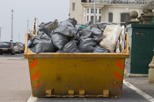 Professional loading of waste into a lockable skip