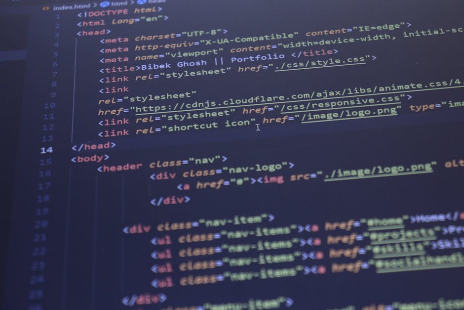 A close-up digital screen displaying lines of computer code in various colors, including red, green, yellow, blue, and white, on a dark background. The code features programming language elements such